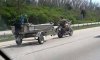 motorcycle_towing_boat_is_not_something_you_see_everyday._5800136663.jpg