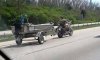 motorcycle_towing_boat_is_not_something_you_see_everyday._5800136663.jpg