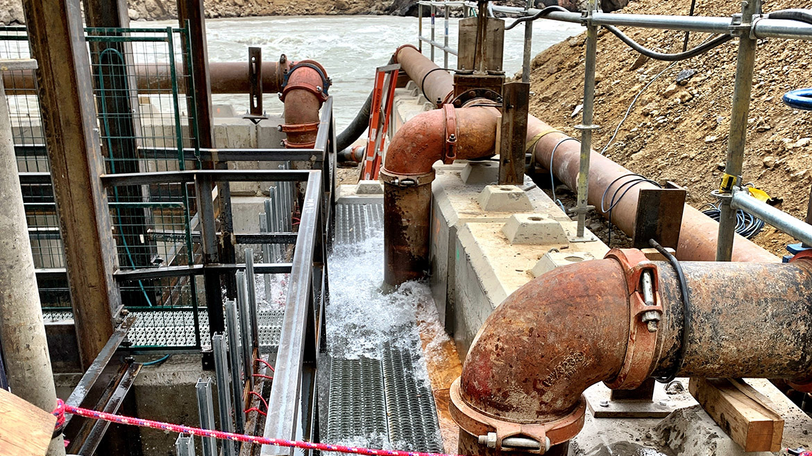 Crews tested the new discharge pumps, which flush water directly into the concrete fish ladder. 